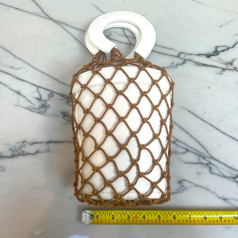 White bucket bag with top handles and rope  mesh detail
